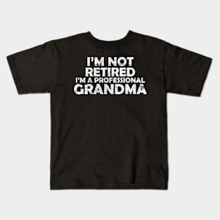 I'm not retired, I'm a professional grandma Kids T-Shirt